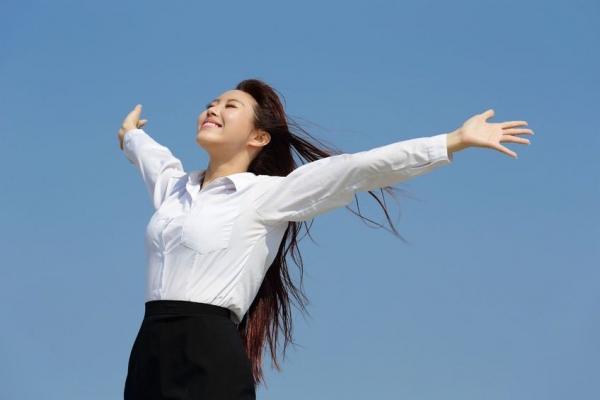 Woman with her arms outstretched