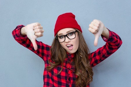 Woman giving a thumbs down