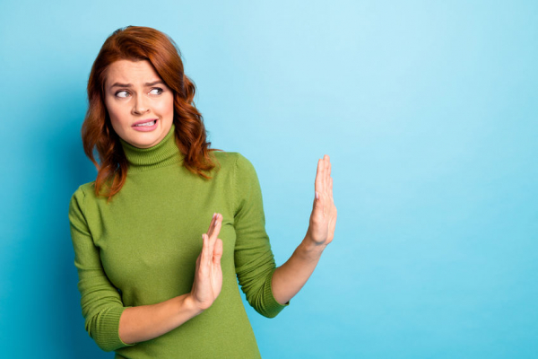 Close-up portrait of her she nice attractive lovely scared afraid wavy-haired girl showing no sign aside, isolated over bright vivid shine vibrant blue turquoise teal color background